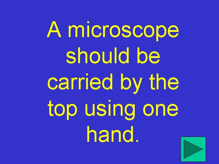 A microscope should be carried by the top using one hand. 