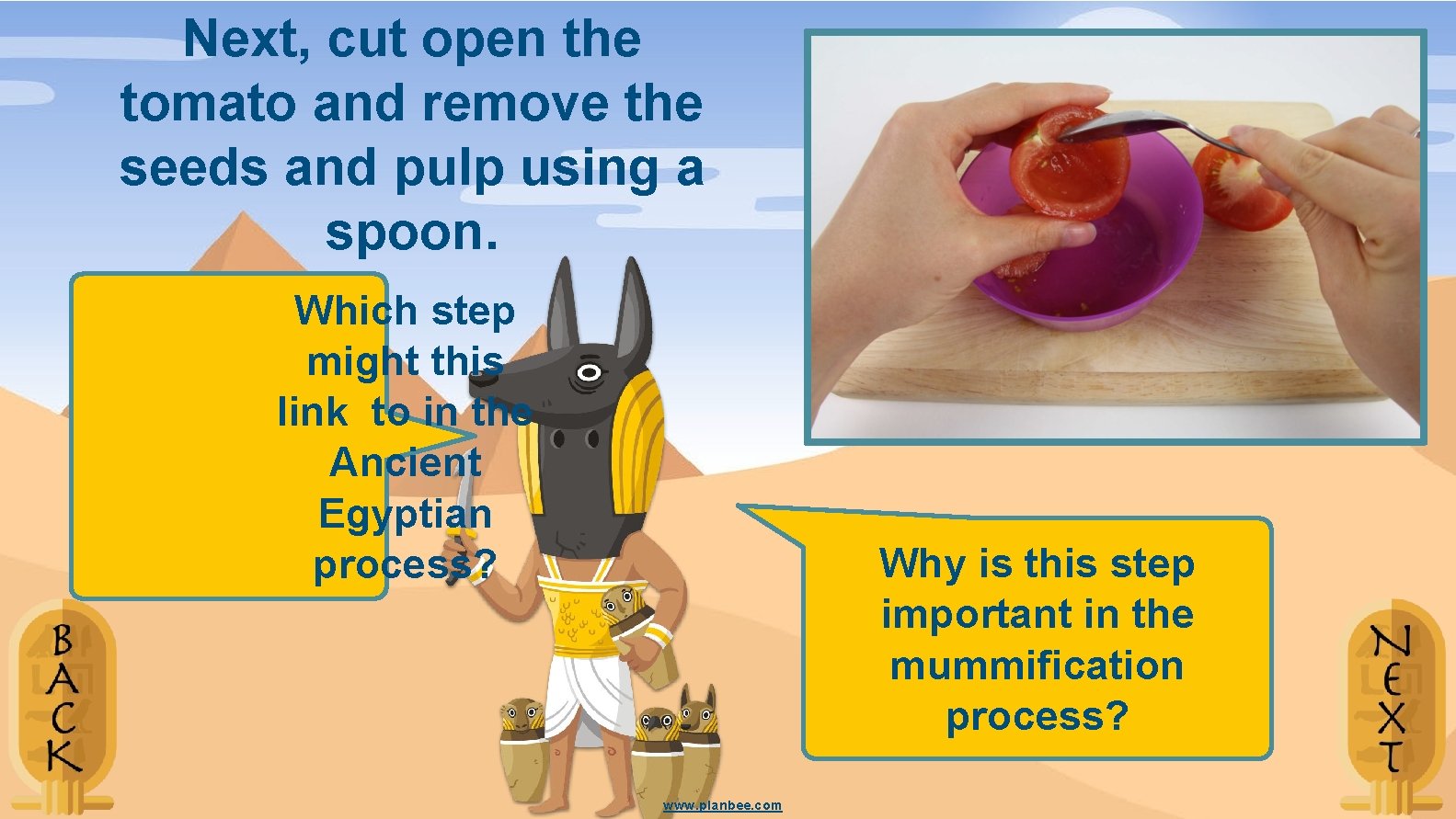 Next, cut open the tomato and remove the seeds and pulp using a spoon.