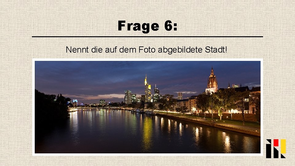 Frage 6: Nennt die auf dem Foto abgebildete Stadt! 