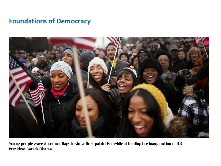Foundations of Democracy Young people wave American flags to show their patriotism while attending