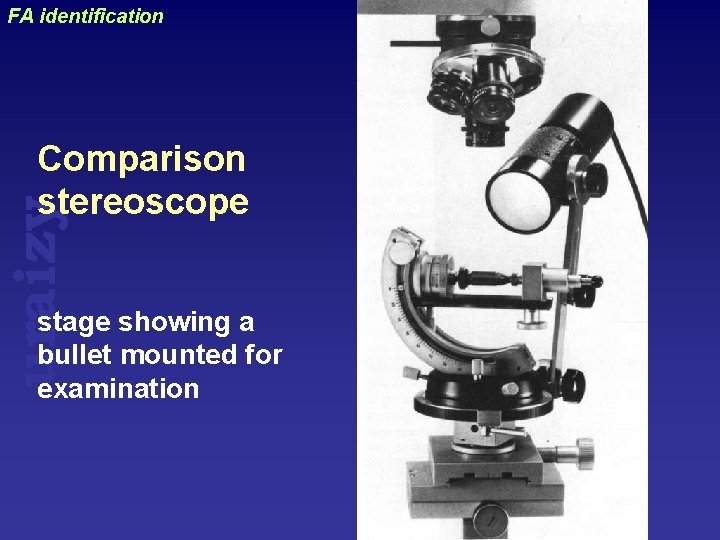 FA identification uraizy Comparison stereoscope stage showing a bullet mounted for examination 