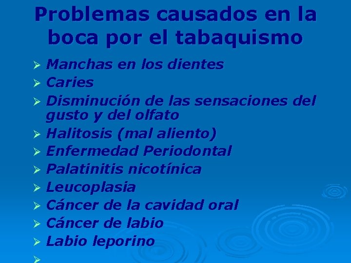 Problemas causados en la boca por el tabaquismo Manchas en los dientes Ø Caries