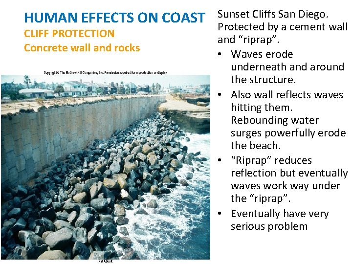 HUMAN EFFECTS ON COAST CLIFF PROTECTION Concrete wall and rocks Sunset Cliffs San Diego.