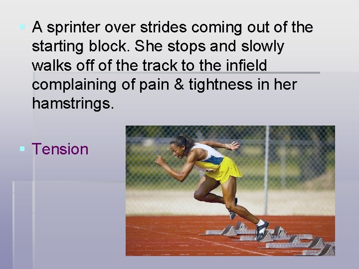 § A sprinter over strides coming out of the starting block. She stops and