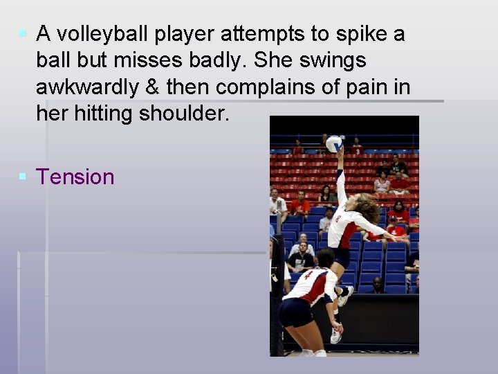 § A volleyball player attempts to spike a ball but misses badly. She swings