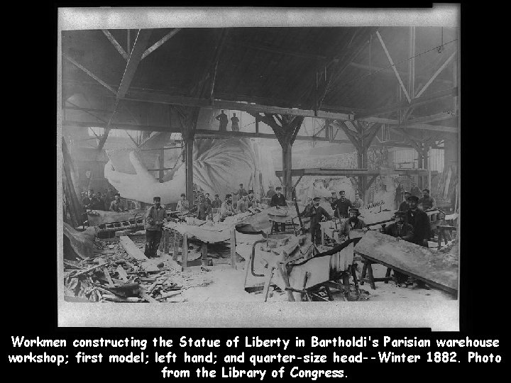 Workmen constructing the Statue of Liberty in Bartholdi's Parisian warehouse workshop; first model; left