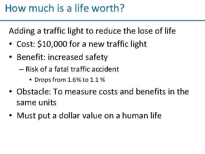 How much is a life worth? Adding a traffic light to reduce the lose