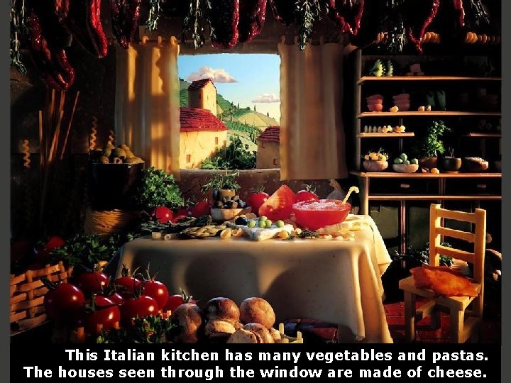 This Italian kitchen has many vegetables and pastas. The houses seen through the window