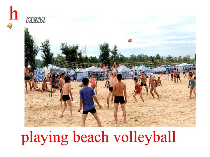 h playing beach volleyball 