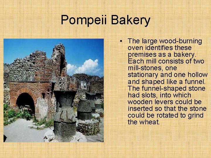 Pompeii Bakery • The large wood-burning oven identifies these premises as a bakery. Each