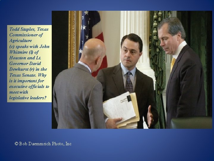 Todd Staples, Texas Commissioner of Agriculture (c) speaks with John Whitmire (l) of Houston