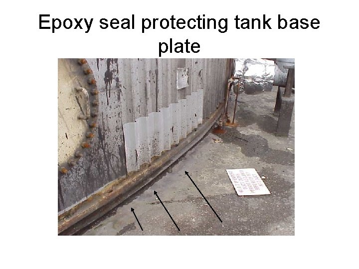Epoxy seal protecting tank base plate 