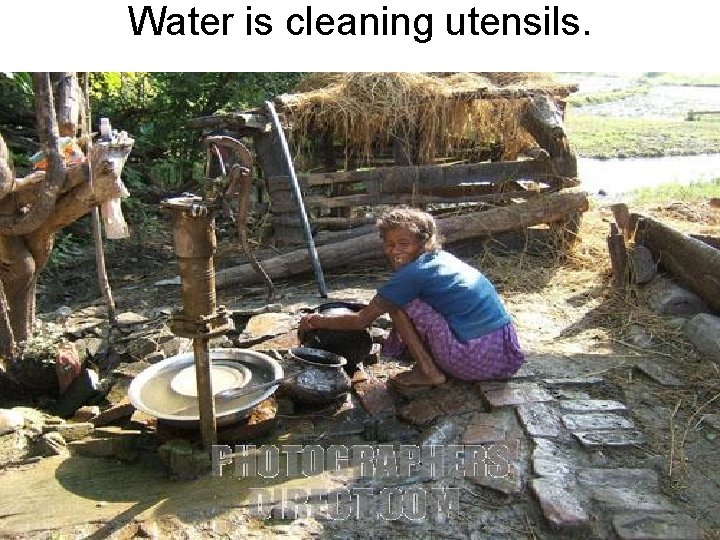 Water is cleaning utensils. 