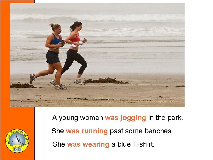 A young woman was jogging in the park. She was running past some benches.