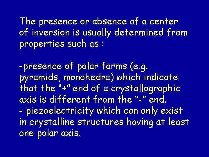 The presence or absence of a center of inversion is usually determined from properties