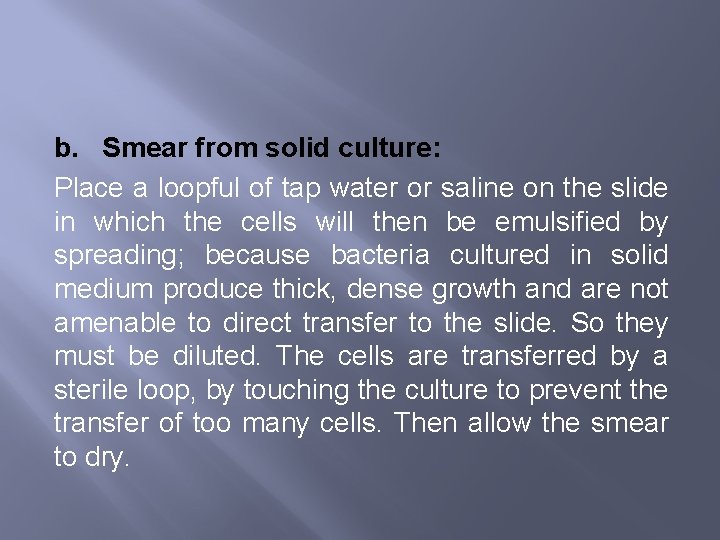 b. Smear from solid culture: Place a loopful of tap water or saline on