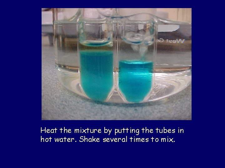 Heat the mixture by putting the tubes in hot water. Shake several times to