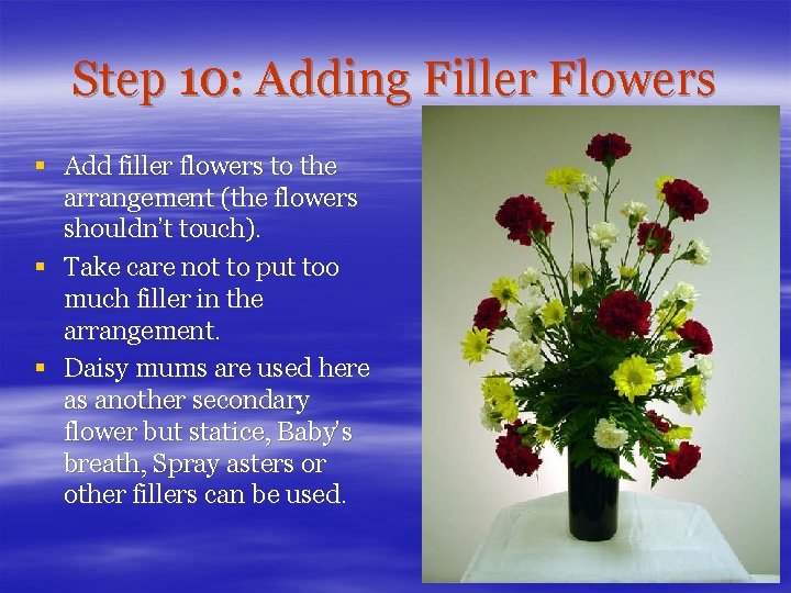 Step 10: Adding Filler Flowers § Add filler flowers to the arrangement (the flowers