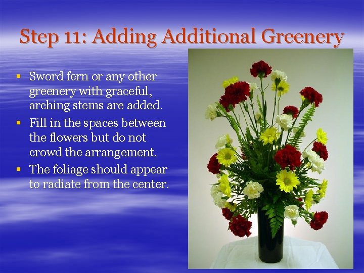 Step 11: Adding Additional Greenery § Sword fern or any other greenery with graceful,