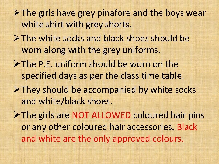 Ø The girls have grey pinafore and the boys wear white shirt with grey