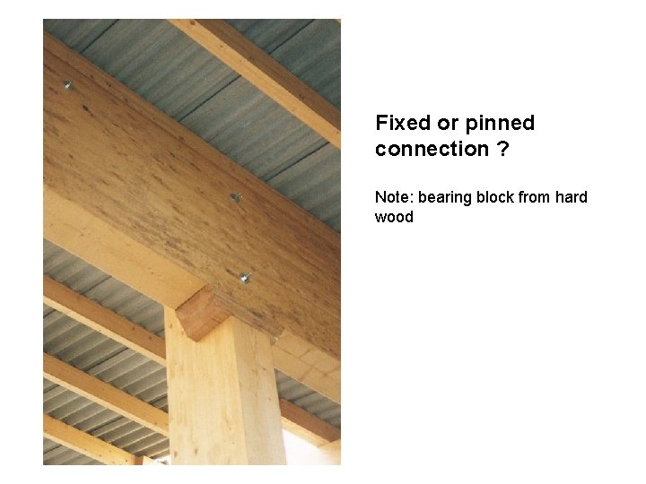 Fixed or pinned connection ? Note: bearing block from hard wood 