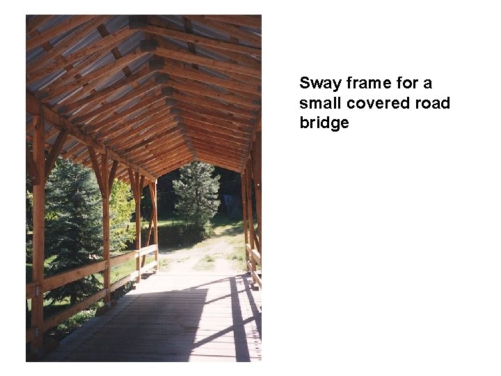 Sway frame for a small covered road bridge 