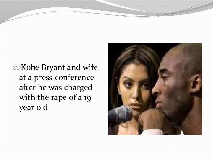  Kobe Bryant and wife at a press conference after he was charged with
