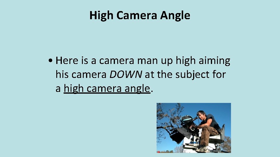 High Camera Angle • Here is a camera man up high aiming his camera