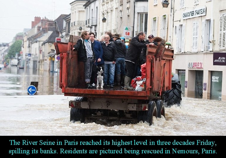 The River Seine in Paris reached its highest level in three decades Friday, spilling