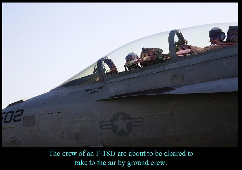 The crew of an F-18 D are about to be cleared to take to