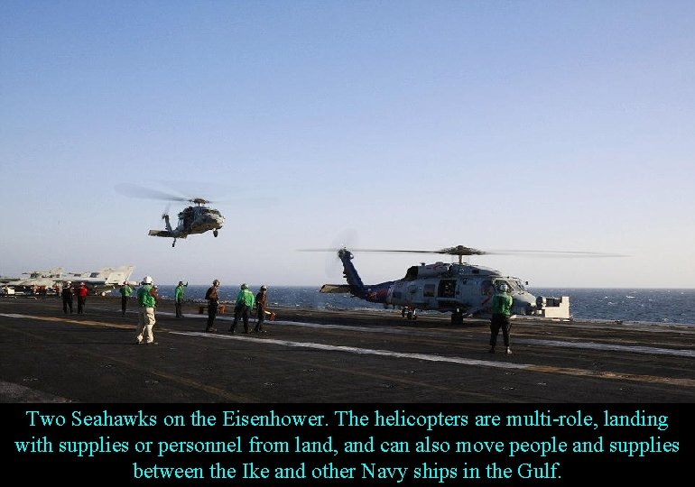 Two Seahawks on the Eisenhower. The helicopters are multi-role, landing with supplies or personnel