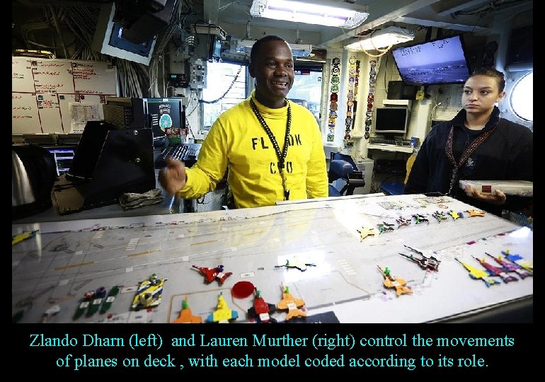 Zlando Dharn (left) and Lauren Murther (right) control the movements of planes on deck