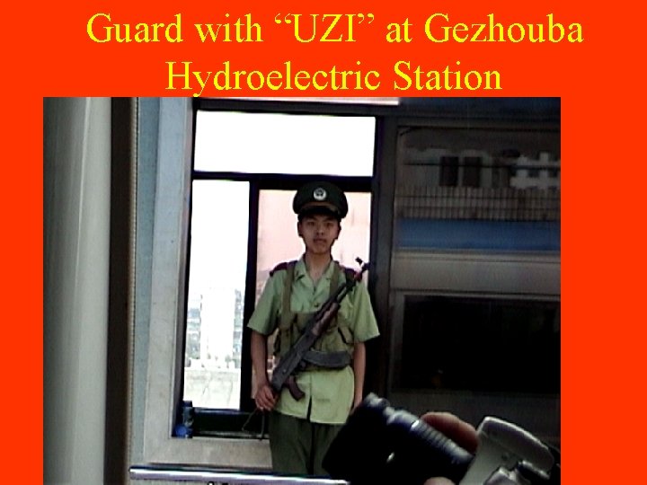 Guard with “UZI” at Gezhouba Hydroelectric Station 