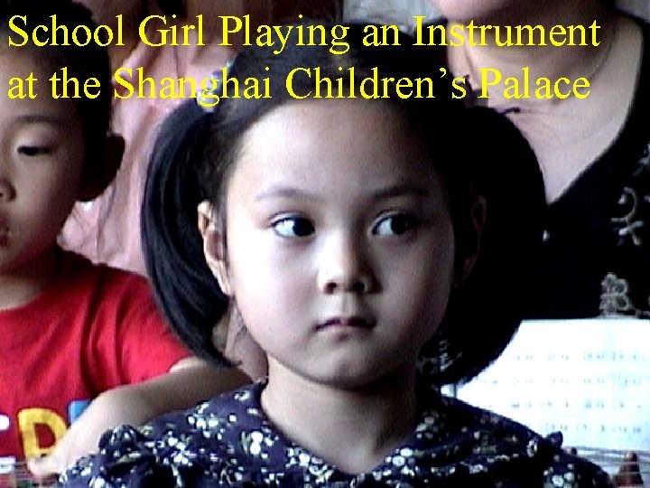 School Girl Playing an Instrument at the Shanghai Children’s Palace 
