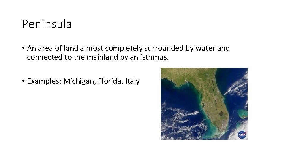 Peninsula • An area of land almost completely surrounded by water and connected to
