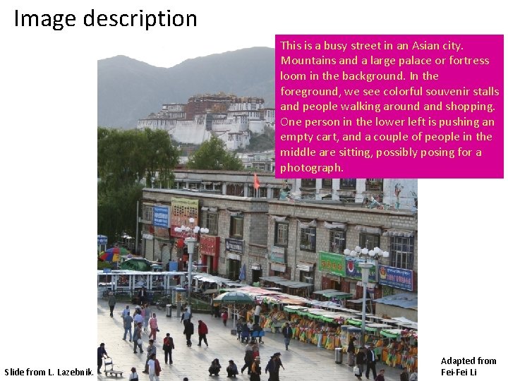 Image description This is a busy street in an Asian city. Mountains and a