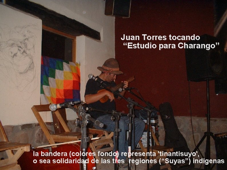 Juan Torres tocando “Estudio para Charango” la bandera (colores fondo) representa 'tinantisuyo', o sea