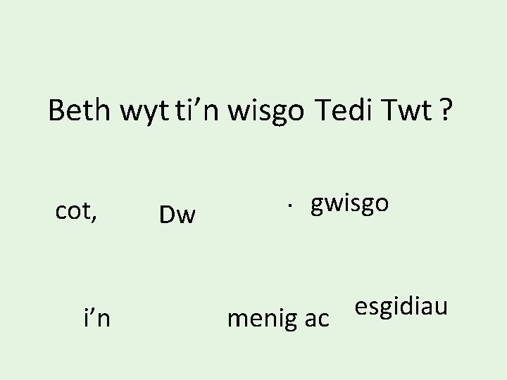 Beth wyt ti’n wisgo Tedi Twt ? cot, i’n Dw . gwisgo esgidiau menig