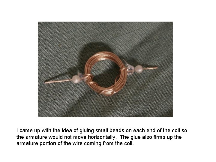 I came up with the idea of gluing small beads on each end of