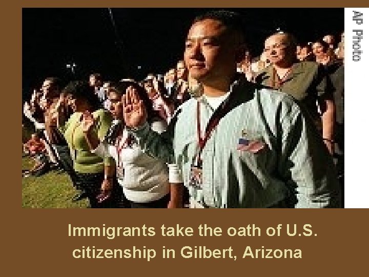 Immigrants take the oath of U. S. citizenship in Gilbert, Arizona 