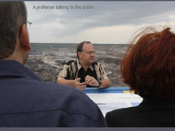 A professor talking to the public 