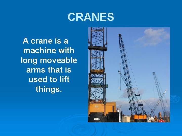 CRANES A crane is a machine with long moveable arms that is used to