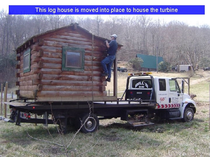 This log house is moved into place to house the turbine 