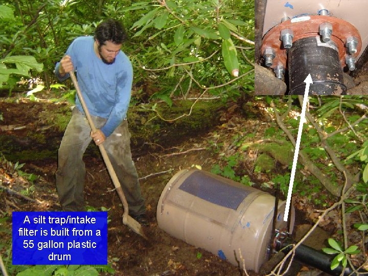 A silt trap/intake filter is built from a 55 gallon plastic drum 