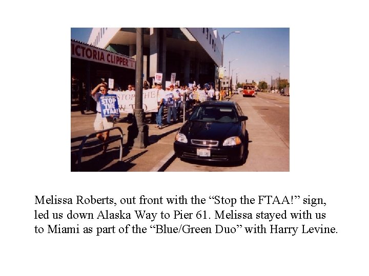 Melissa Roberts, out front with the “Stop the FTAA!” sign, led us down Alaska