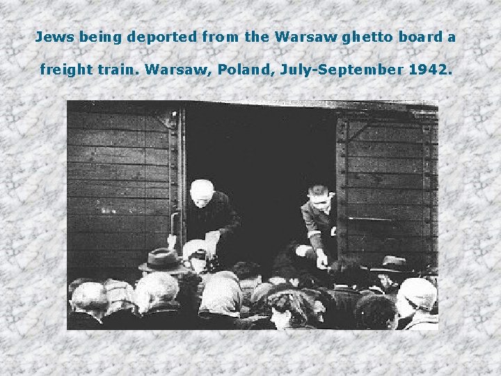 Jews being deported from the Warsaw ghetto board a freight train. Warsaw, Poland, July-September