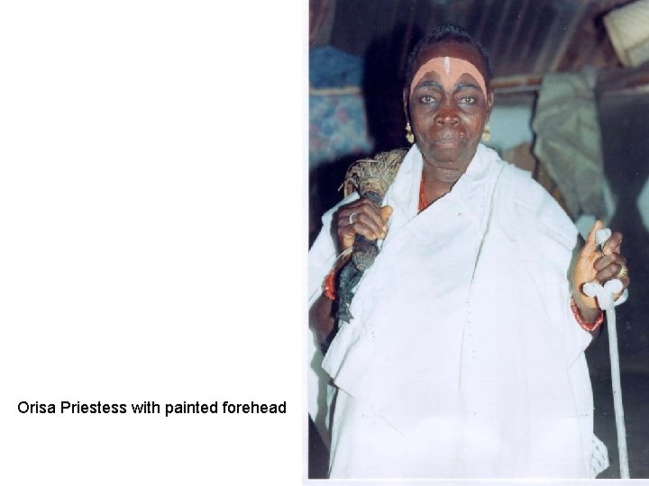 Orisa Priestess with painted forehead 