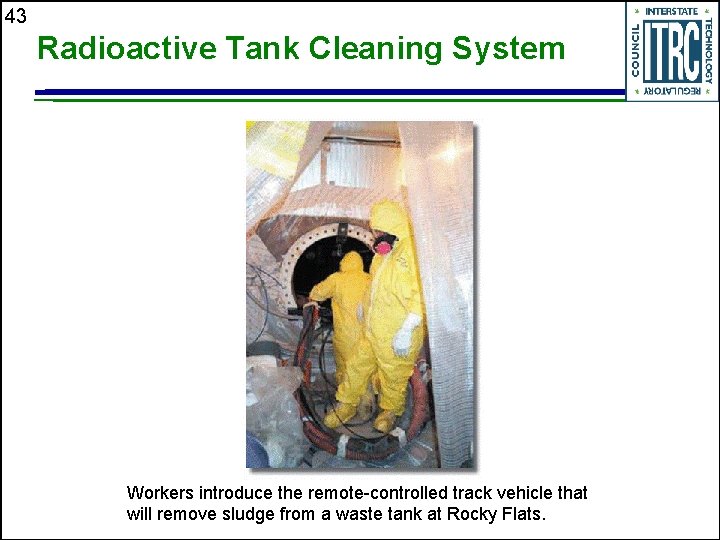 43 Radioactive Tank Cleaning System Workers introduce the remote-controlled track vehicle that will remove