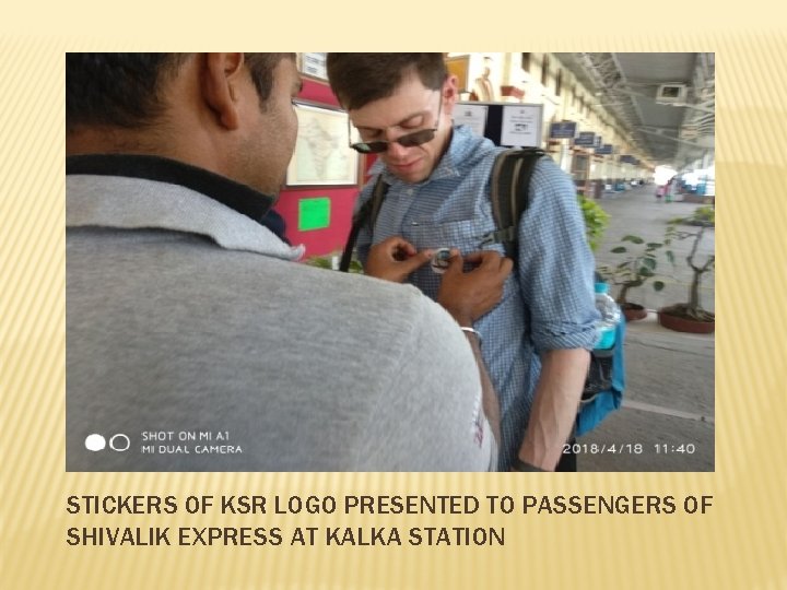 STICKERS OF KSR LOGO PRESENTED TO PASSENGERS OF SHIVALIK EXPRESS AT KALKA STATION 