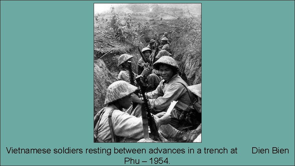 Vie Vietnamese soldiers resting between advances in a trench at Phu – 1954. Dien